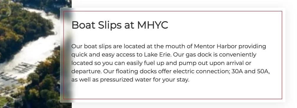 Boat Slips at MHYC on the About page: a frosted card with a red frame overlapping an aerial photograph of the harbour, which blurs where the glass covers it.