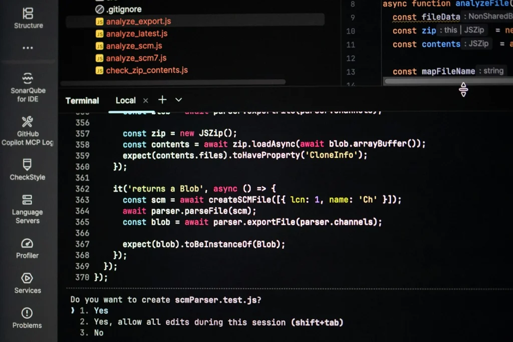 Coding on a dark theme computer screen